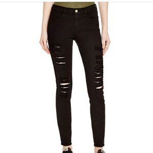 Frame ripped black jeans
